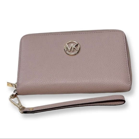 Michael Kors Handbags - Pink Michael Kors zip wallet